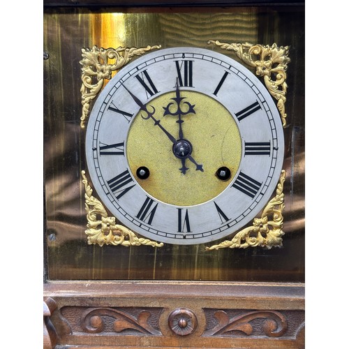 1031 - An oak mantle clock with inscriptions to inside 9030 85