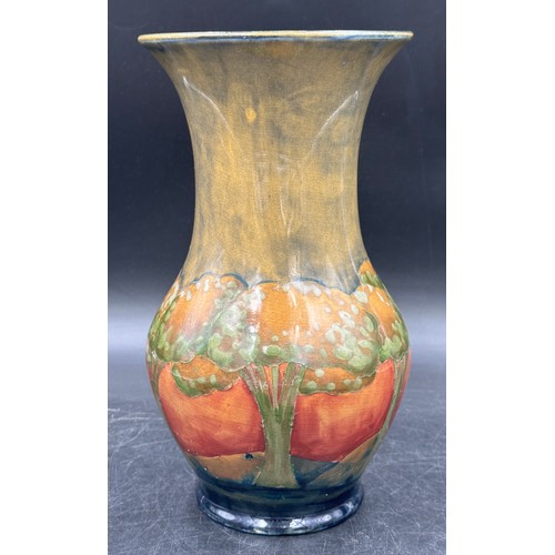 308 - A  Moorcroft Pottery vase in the 'Eventide' pattern designed by William Moorcroft signed to base 24.... 