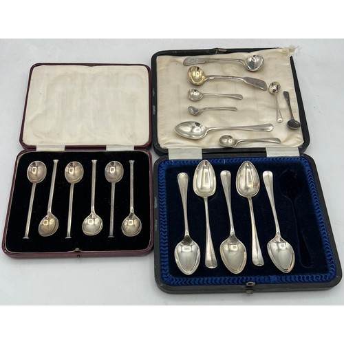 848 - Silver spoons to include a boxed set of six Sheffield 1928, boxed set of five and other salt spoons ... 