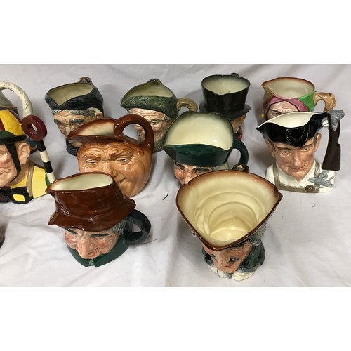 313 - A collection of Royal Doulton character & Toby Jugs to include Dick Turpin, Uncle Tom Cobbly D6337, ... 