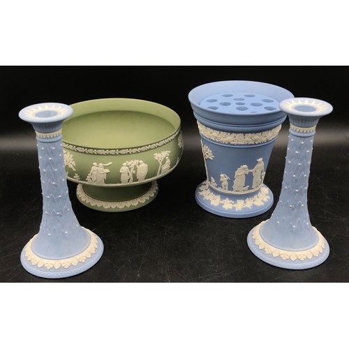 314 - A collection of Wedgwood Jasperware items to include a pair of boxed Acanthus blue ground candlestic... 