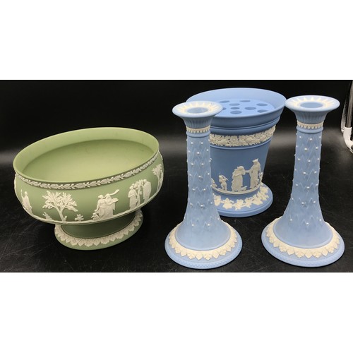 314 - A collection of Wedgwood Jasperware items to include a pair of boxed Acanthus blue ground candlestic... 