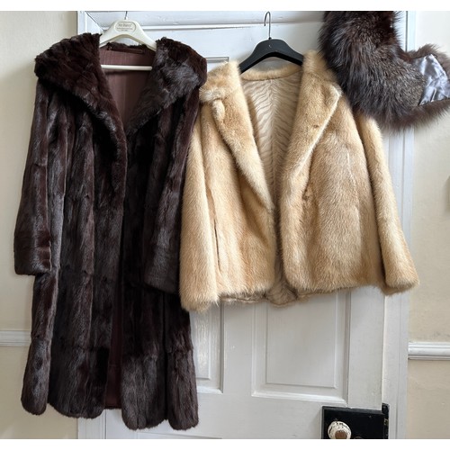 1074 - A brown mink coat approx. shoulder to hem 100cm from underarm to underarm 51cm and a pale mink jacke... 