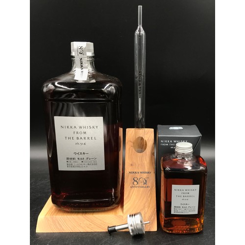 716 - A bottle of Nikka whisky from the Barrel 3000ml celebrating the 80th anniversary on wooden display s... 