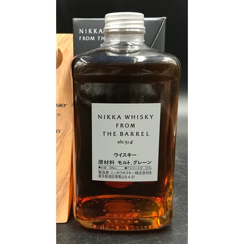 716 - A bottle of Nikka whisky from the Barrel 3000ml celebrating the 80th anniversary on wooden display s... 