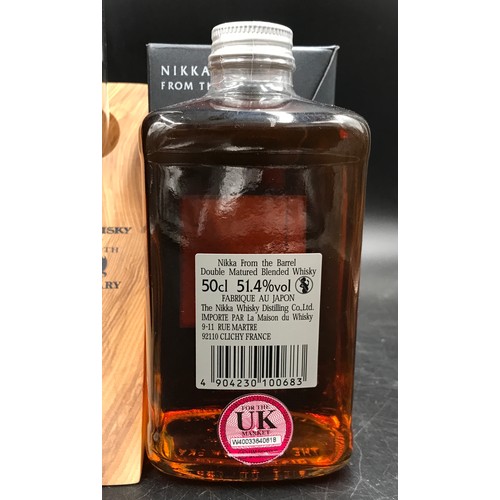 716 - A bottle of Nikka whisky from the Barrel 3000ml celebrating the 80th anniversary on wooden display s... 