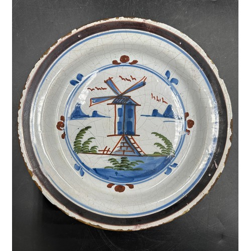 317 - A Delft plate probably 18thC Dutch with hand painted windmill design together with a continental twi... 