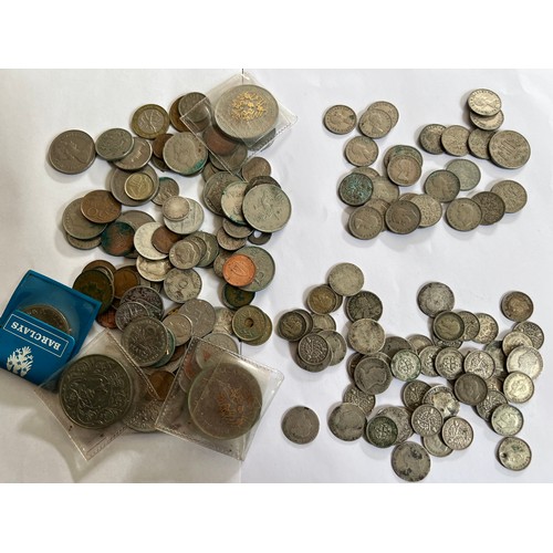 674 - A collection of coins to include mostly pre 1940 threepences, post 1940 sixpences and various other ... 