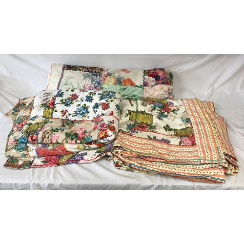 1075 - Three large vintage patchwork quilts decorated in flower design largest approx. 145 x 160cm.