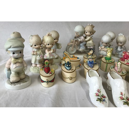 322 - A collection of 11 Precious Moments figurines to include 'Bon Voyage', 'Just a line to say your spec... 