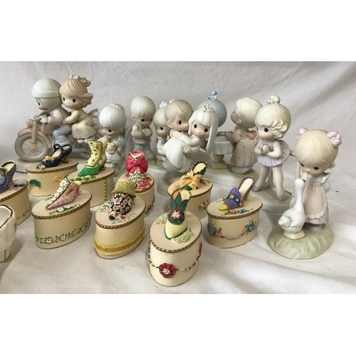 322 - A collection of 11 Precious Moments figurines to include 'Bon Voyage', 'Just a line to say your spec... 