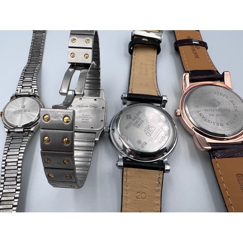 633 - Replica watches to include Rolex, Cartier and two Patek Philippe.