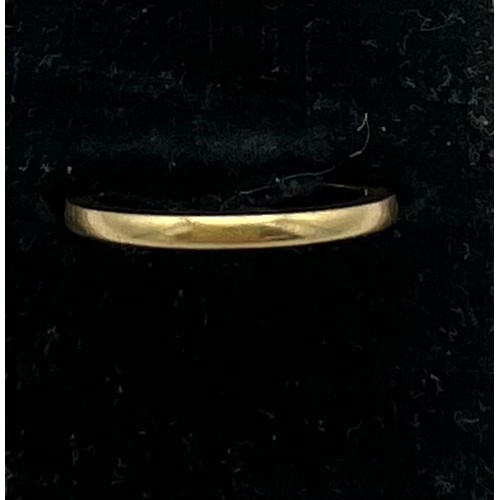 457 - An 18 carat gold wedding band, size K, weight 2.2gm. ‘Fidelity’ inscribed to inside.