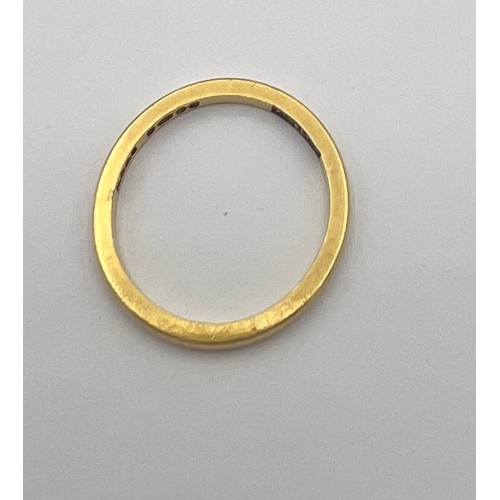 457 - An 18 carat gold wedding band, size K, weight 2.2gm. ‘Fidelity’ inscribed to inside.