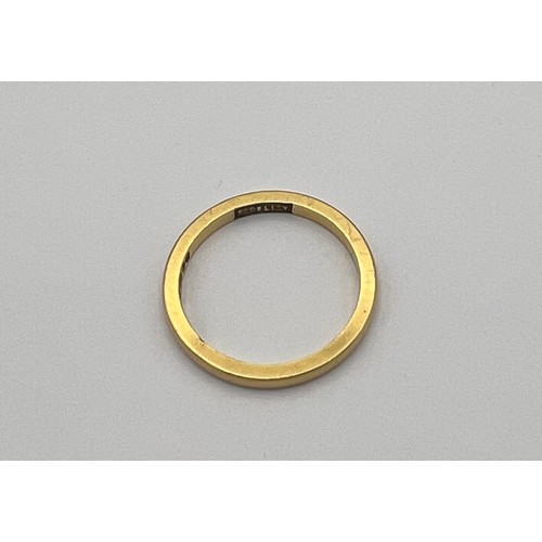 457 - An 18 carat gold wedding band, size K, weight 2.2gm. ‘Fidelity’ inscribed to inside.