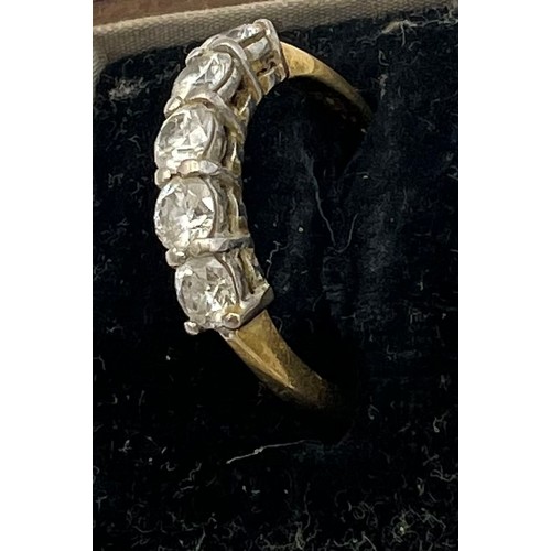 461 - A five stone diamond ring set in 18 carat yellow gold. Size M/N, weight 3gm.