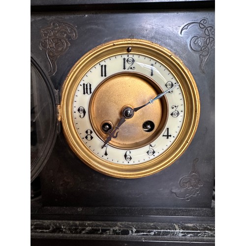 1034 - A 19thC black marble mantel clock with visible brocot movement. 32 h x 38cm w.