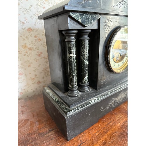 1034 - A 19thC black marble mantel clock with visible brocot movement. 32 h x 38cm w.