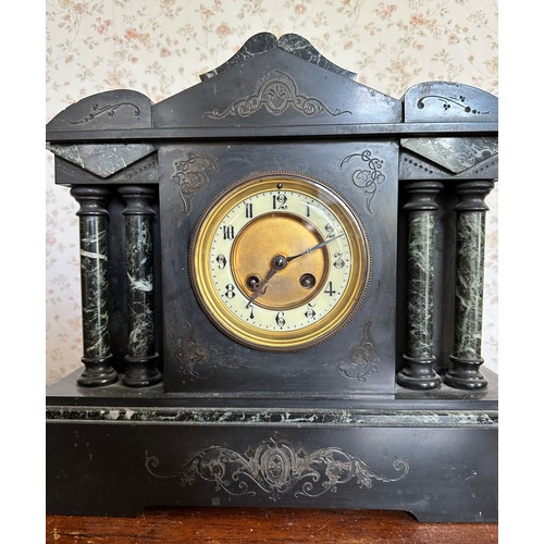 1034 - A 19thC black marble mantel clock with visible brocot movement. 32 h x 38cm w.