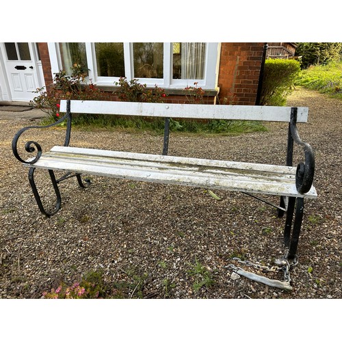 187 - A cast iron and wooden bench. 183.5 l x 62 d x 77cm h.