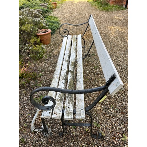 187 - A cast iron and wooden bench. 183.5 l x 62 d x 77cm h.