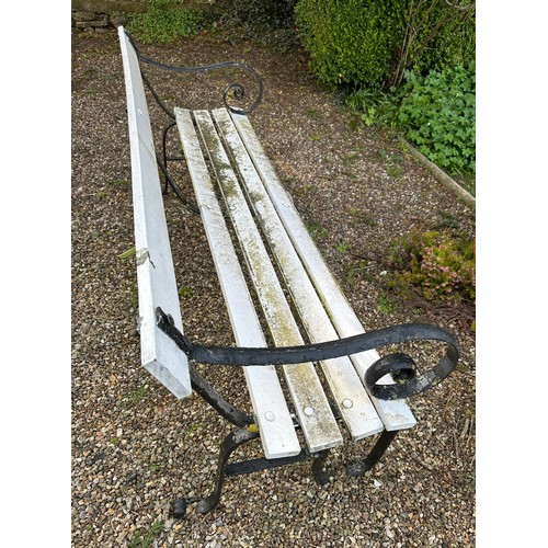 187 - A cast iron and wooden bench. 183.5 l x 62 d x 77cm h.