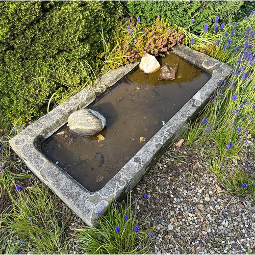 188 - A stone trough. 114 l x 54.5 d x 14cm h.