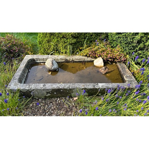 188 - A stone trough. 114 l x 54.5 d x 14cm h.