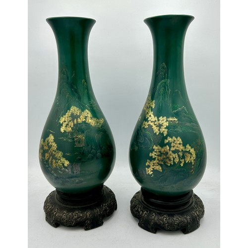 881 - Two green lacquer ware vases 33cm h.