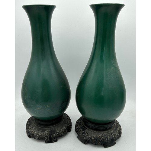 881 - Two green lacquer ware vases 33cm h.