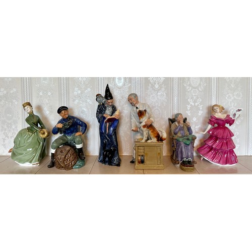 334 - A collection of Royal Doulton figurines x 6 to include The Lobster Man HN 2317, The Wizard HN 2877, ... 