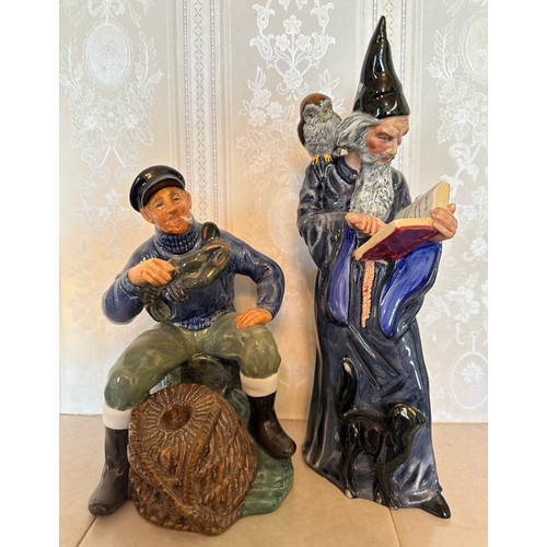 334 - A collection of Royal Doulton figurines x 6 to include The Lobster Man HN 2317, The Wizard HN 2877, ... 