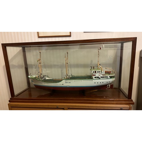 1215 - Model of Berg Line ship, J Scott, Goole in mahogany and glass. 59h x 121 w x 38cm d.