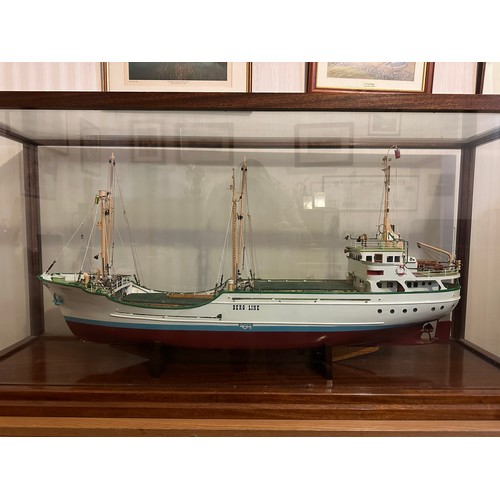 1215 - Model of Berg Line ship, J Scott, Goole in mahogany and glass. 59h x 121 w x 38cm d.