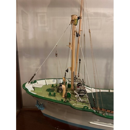 1215 - Model of Berg Line ship, J Scott, Goole in mahogany and glass. 59h x 121 w x 38cm d.