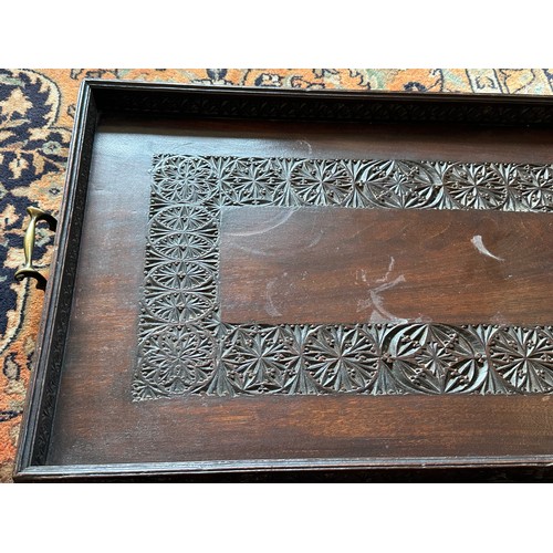 1216 - Two hardwood trays, one carved and one inlaid with butterfly wings. Largest 64 x 41cm without handle... 