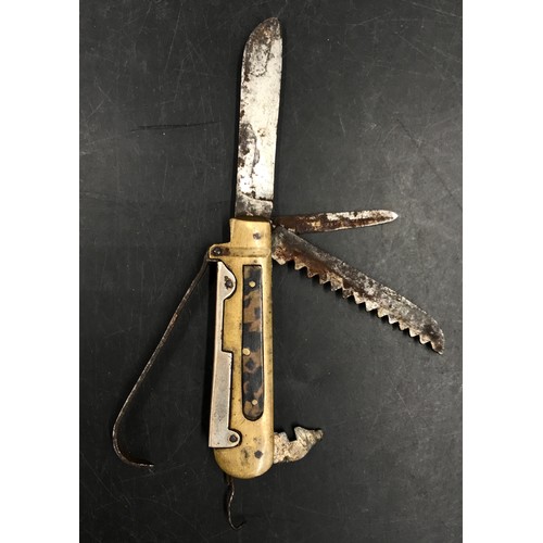 1217 - A fisherman's pocket knife with scales holding large knife, small knife, saw, can opener, hook and s... 