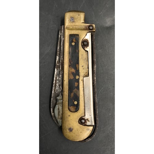 1217 - A fisherman's pocket knife with scales holding large knife, small knife, saw, can opener, hook and s... 