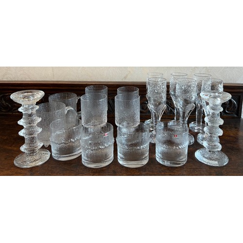 381 - A quantity of Littala glass ware from Finland to include two candlesticks, 18cm together with  six E... 