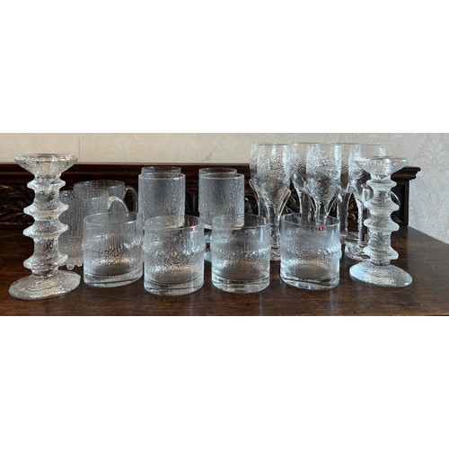 381 - A quantity of Littala glass ware from Finland to include two candlesticks, 18cm together with  six E... 