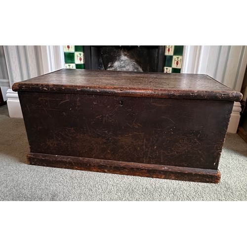 124 - A pine lidded blanket box with metal drop handles. 87 w x 43 d x 39cm h.