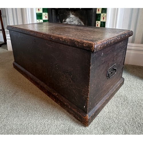 124 - A pine lidded blanket box with metal drop handles. 87 w x 43 d x 39cm h.