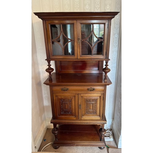 135 - An Edwardian mahogany cabinet, cupboard and single drawer to base, glazed doors to top with 4 compar... 