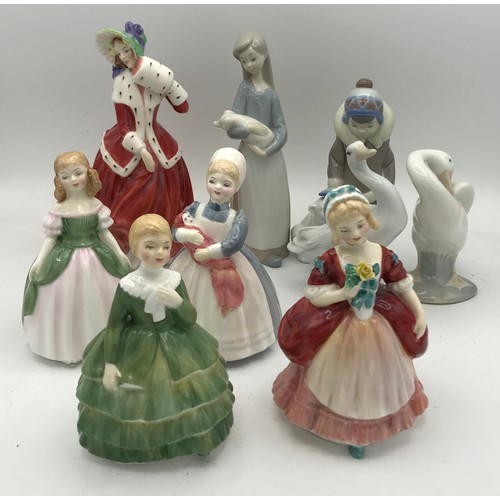 340 - A collection of ceramic figures to include four Lladro: Eskimo Boy With Pet, Girl with pig and two d... 