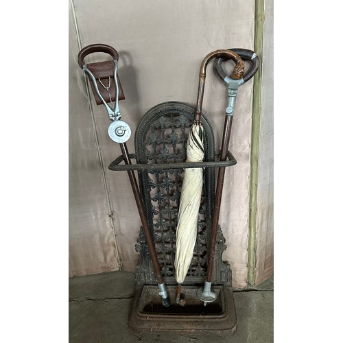 1240 - A Victorian cast iron stick stand with removable drip tray. registration lozenge to rear, together w... 