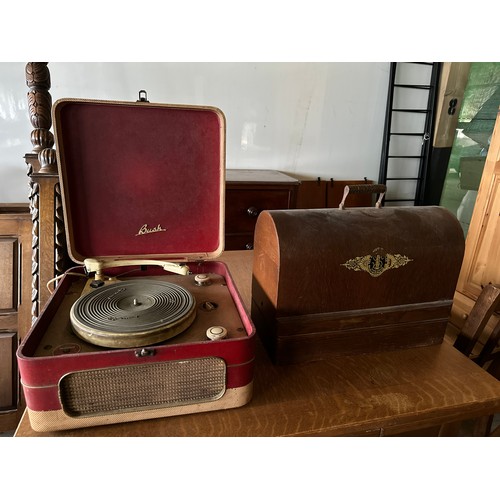 1243 - A Bush Garrard 4SP record player together with a Singer sewing machine.