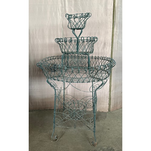 189 - A vintage wire work plant display stand with three tiers. 109cm h x 66cm w.