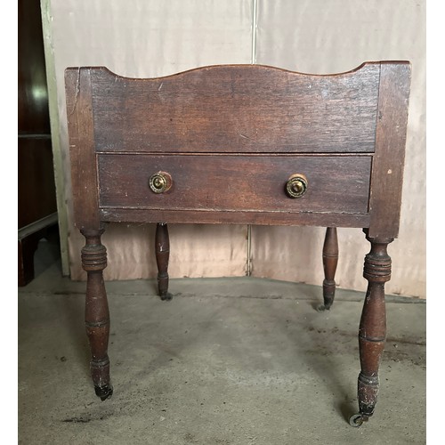 146 - A 19thC mahogany night stand with single drawer to front, on brass castors and with brass knobs. 49c... 