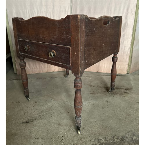 146 - A 19thC mahogany night stand with single drawer to front, on brass castors and with brass knobs. 49c... 