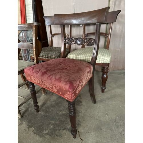 147 - Three 19thC bar backed dining chairs (a pair and a single) and a chapel chair with storage for praye... 